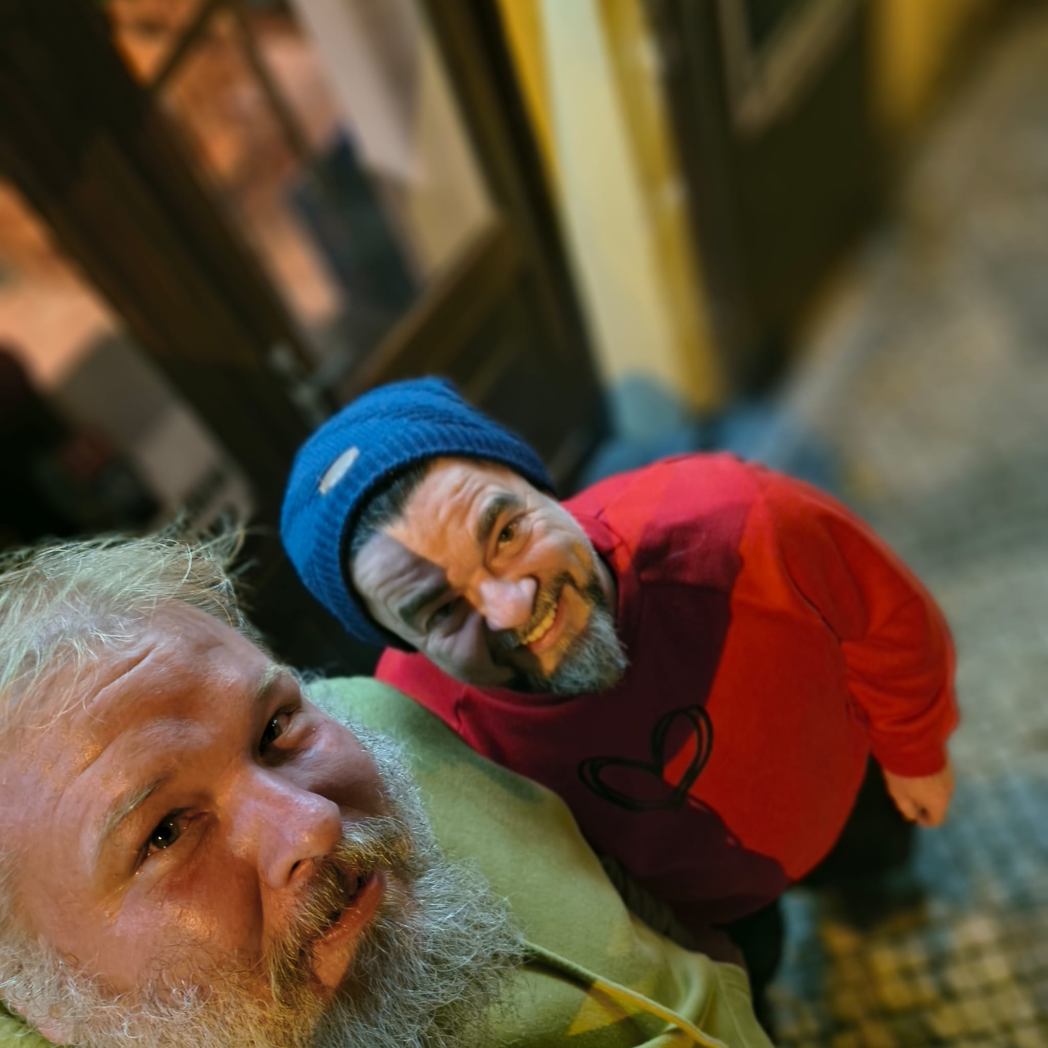 The first giant standing by a mountain